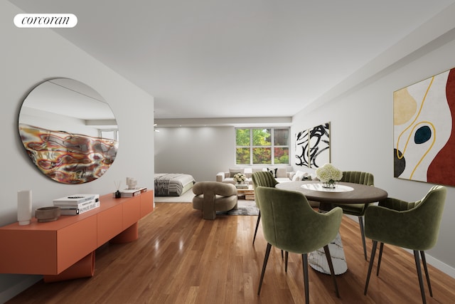 dining room with wood finished floors
