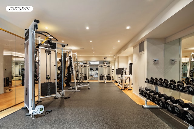 exercise room with recessed lighting