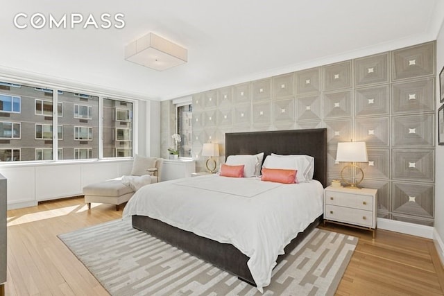 350 E 57th St Unit 14B, New York City, NY 10022 - bedroom with wood finished floors