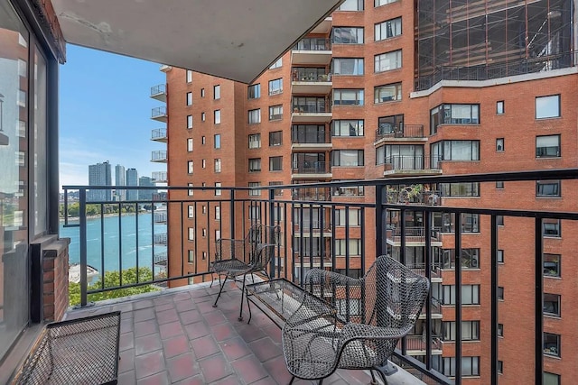 balcony featuring a view of city