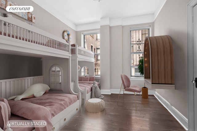 bedroom featuring dark wood-type flooring and baseboards