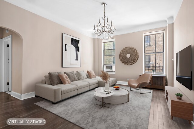 318 W 100th St Unit 1D, New York City, NY 10025 - living area featuring arched walkways, baseboards, and hardwood / wood-style flooring