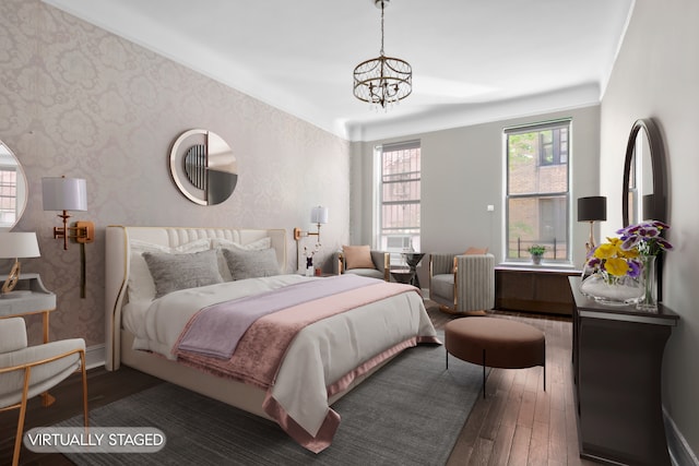 318 W 100th St Unit 1D, New York City, NY 10025 - bedroom featuring hardwood / wood-style floors, a chandelier, wallpapered walls, and baseboards