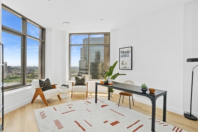 75 Wall St Unit Phd2, New York City, NY 10005 - office featuring light wood finished floors and expansive windows