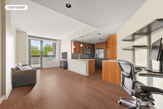 108-20 71st Ave Unit 2D, New York City, NY 11375 - office area with a sink, baseboards, wood finished floors, and recessed lighting