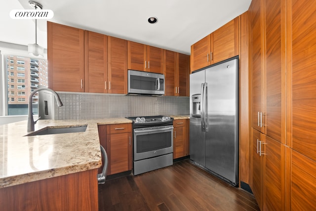 108-20 71st Ave Unit 2D, New York City, NY 11375 - kitchen with stainless steel appliances, a sink, decorative backsplash, brown cabinetry, and dark wood-style floors