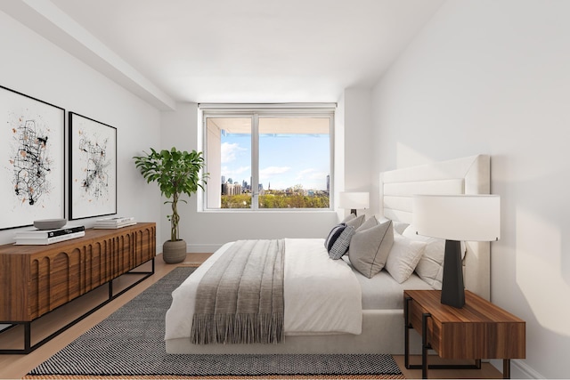 bedroom featuring baseboards