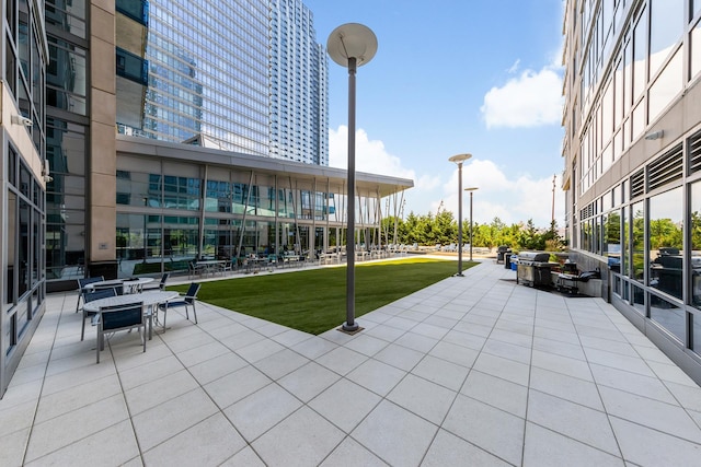 surrounding community with a yard