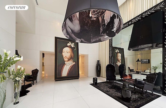 340 E 23rd St Unit Ph2F, New York City, NY 10010 - lobby featuring tile walls
