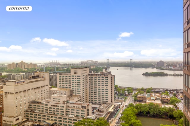 view of city featuring a notable bridge and a nearby body of water