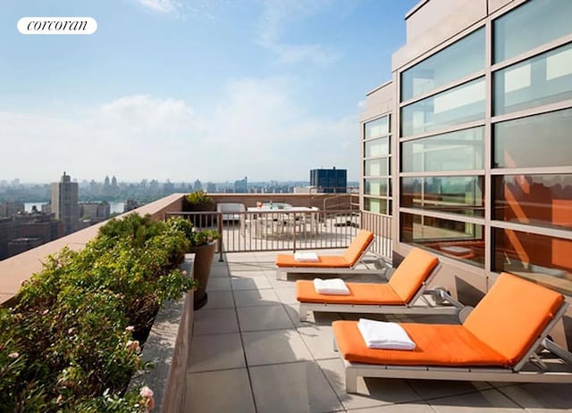 balcony featuring a city view
