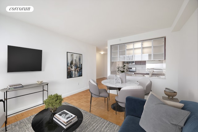 living room with baseboards