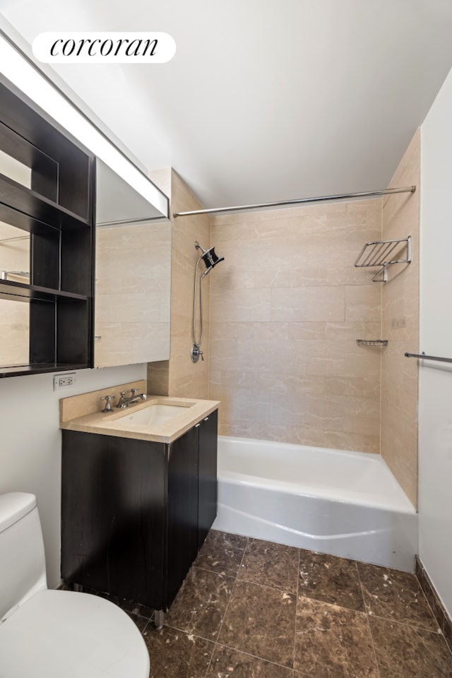 bathroom featuring toilet,  shower combination, and vanity