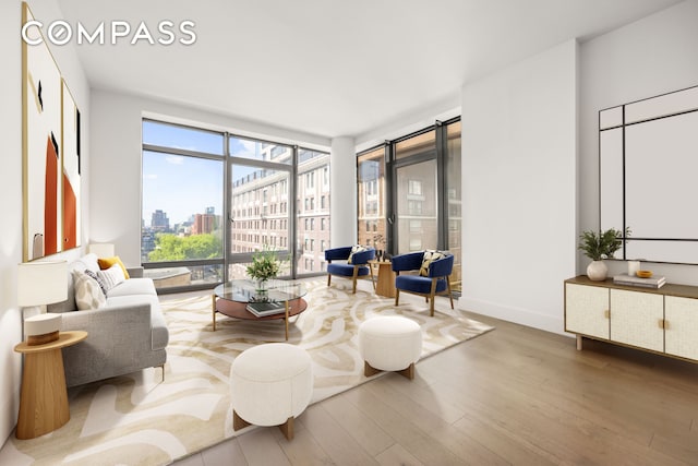 319 Schermerhorn St Unit 6B, New York City, NY 11217 - living area with hardwood / wood-style flooring, a view of city, and expansive windows