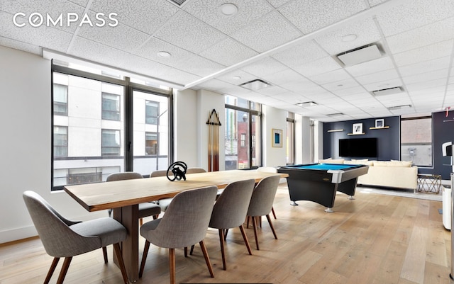 319 Schermerhorn St Unit 6B, New York City, NY 11217 - dining space with light wood-style flooring, a paneled ceiling, and pool table