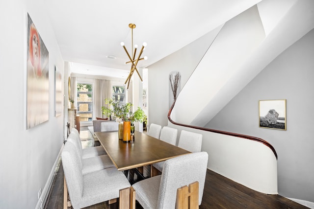 262 W 25th St, New York City, NY 10001 - dining area with a chandelier and wood finished floors