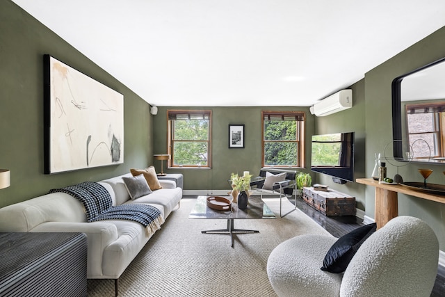 262 W 25th St, New York City, NY 10001 - living area with a wall mounted air conditioner and wood finished floors