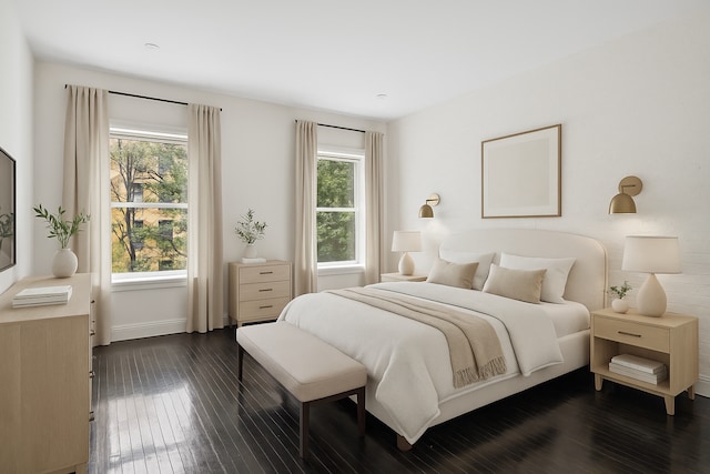 262 W 25th St, New York City, NY 10001 - bedroom featuring dark wood finished floors and baseboards