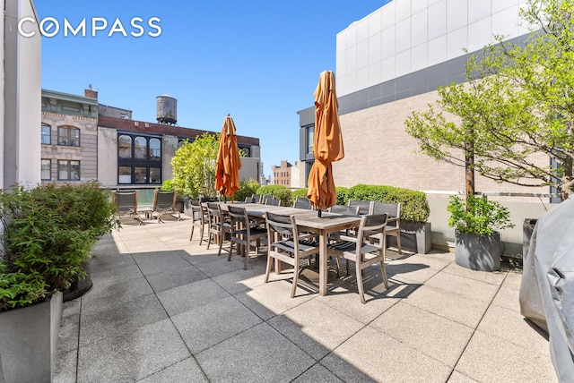view of patio with outdoor dining area