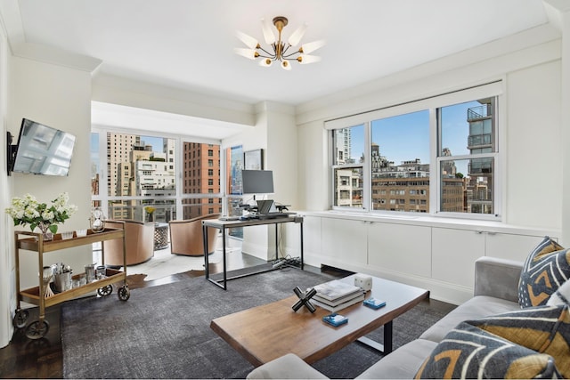 living area featuring an office area, a chandelier, and wood finished floors
