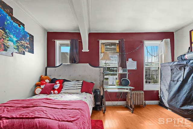 13 Suydam Place, New York City, NY 11233 - bedroom featuring radiator, hardwood / wood-style flooring, and crown molding