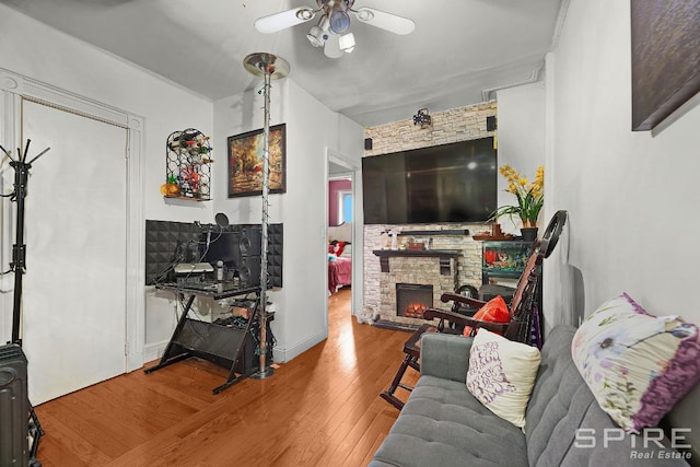 13 Suydam Place, New York City, NY 11233 - living area featuring ceiling fan, hardwood / wood-style floors, and a fireplace