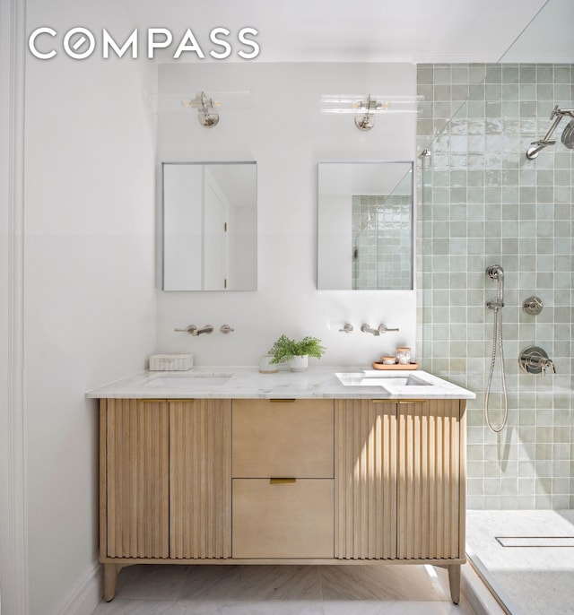 151 Chauncey St, New York City, NY 11233 - bathroom with a tile shower and double vanity