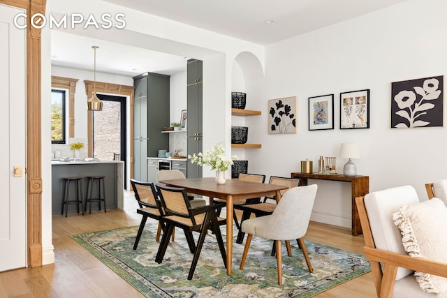 151 Chauncey St, New York City, NY 11233 - dining room featuring light wood finished floors