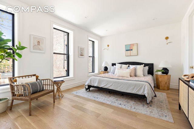 151 Chauncey St, New York City, NY 11233 - bedroom with light wood-style floors and baseboards