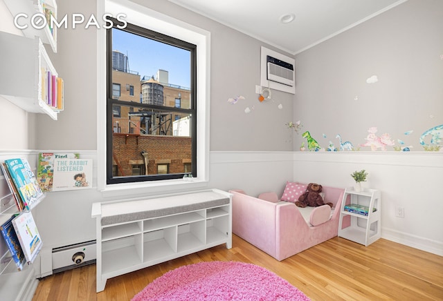 315 W 99th St Pha, Pha, New York City, NY 10025 - sitting room featuring wood finished floors, crown molding, and baseboards