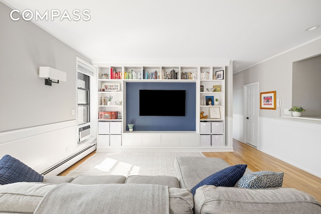 315 W 99th St Pha, Pha, New York City, NY 10025 - living area with baseboard heating, light wood-type flooring, and ornamental molding