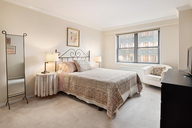 bedroom featuring crown molding, carpet, and baseboards
