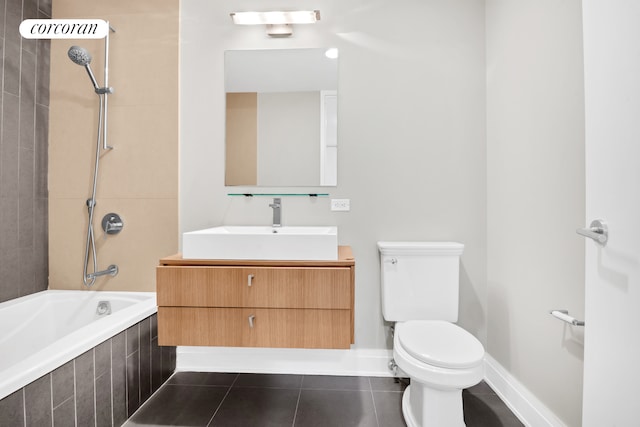 124 W 24th St Unit 4B, New York City, NY 10011 - bathroom featuring vanity, tiled shower / bath combo, and tile patterned flooring