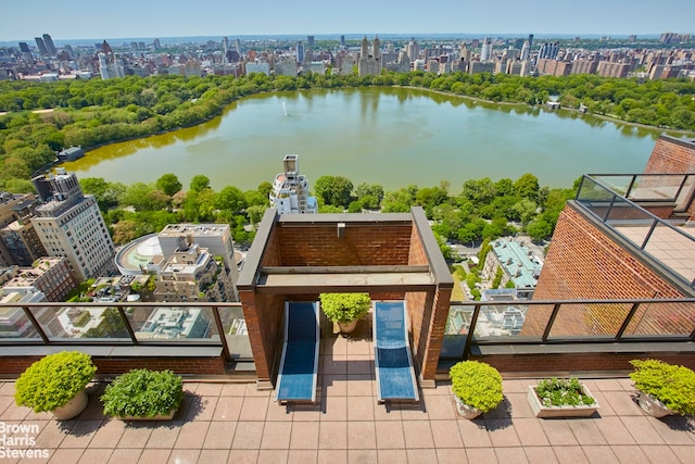 view of urban area featuring a large body of water