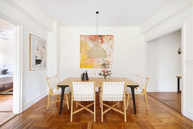 dining room featuring baseboards