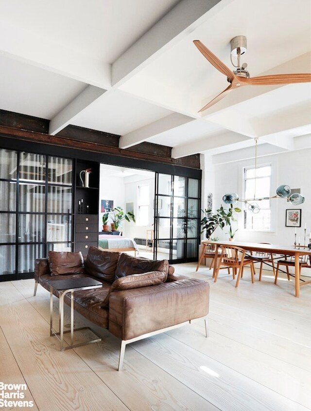 135 Hudson St Unit 6F, New York City, NY 10013 - living area featuring beamed ceiling, hardwood / wood-style flooring, a ceiling fan, and coffered ceiling