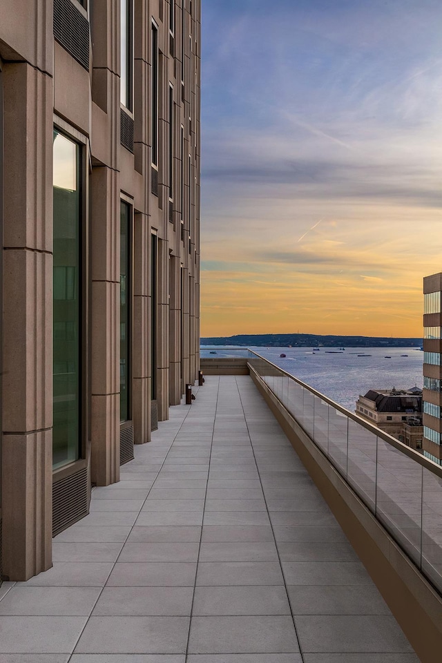 surrounding community with a water view
