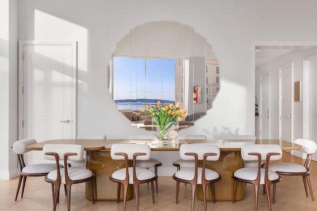 dining room featuring stairs