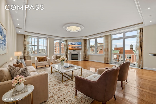 105 Oceana Dr E Unit Ph1D, New York City, NY 11235 - living room with a raised ceiling, plenty of natural light, light wood finished floors, and recessed lighting
