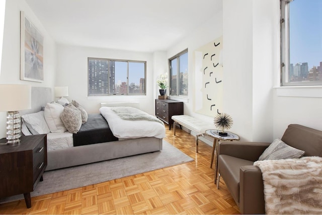 bedroom with a view of city