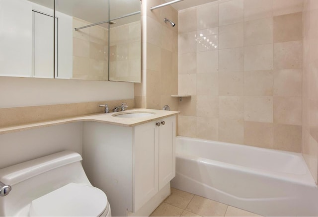 bathroom with tile patterned flooring, toilet, shower / tub combination, and vanity