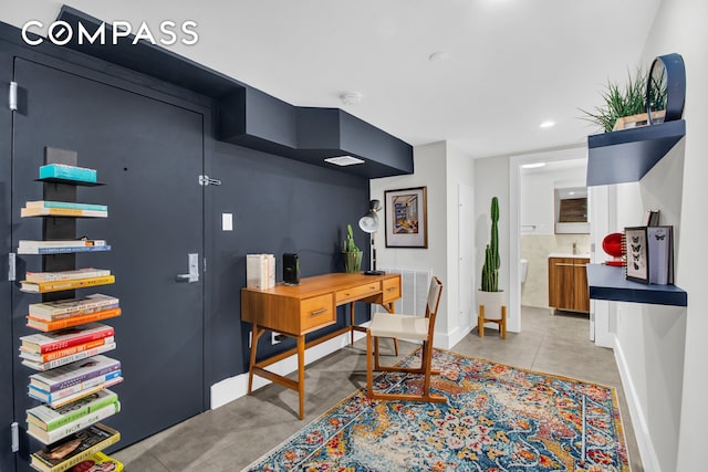 home office featuring baseboards and recessed lighting