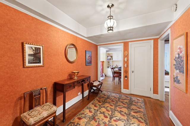 205 E 78th St Unit 12J, New York City, NY 10021 - corridor featuring wood finished floors, crown molding, and baseboards