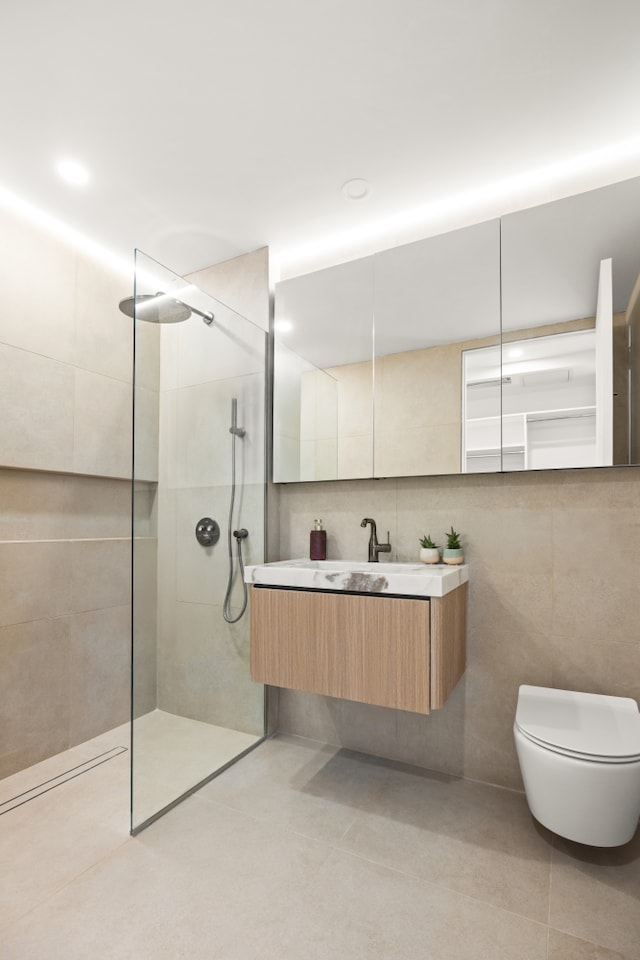 1110 Manhattan Ave Unit 2, New York City, NY 11222 - full bath featuring tile walls, tile patterned flooring, walk in shower, vanity, and decorative backsplash