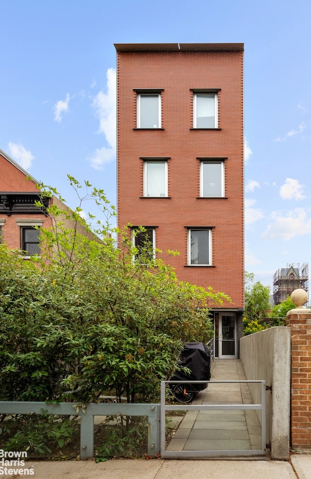 114 4th Pl Unit 2, New York City, NY 11231 - view of building exterior with a fenced front yard