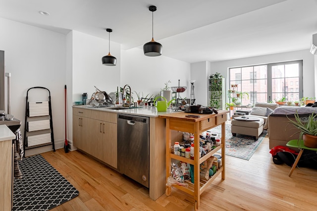 77 Clarkson Ave Unit 4-C, New York City, NY 11226 - kitchen with dishwasher, light wood-type flooring, light countertops, and pendant lighting