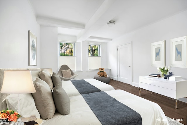 bedroom featuring dark wood-style floors, baseboards, and beam ceiling