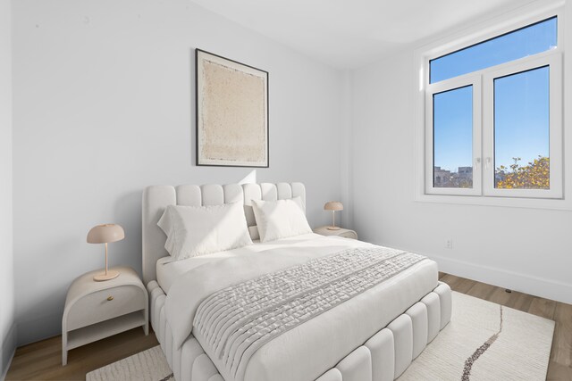 68 N Henry St Unit 4F, New York City, NY 11222 - bedroom featuring wood finished floors and baseboards