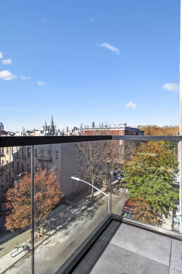 balcony featuring a city view