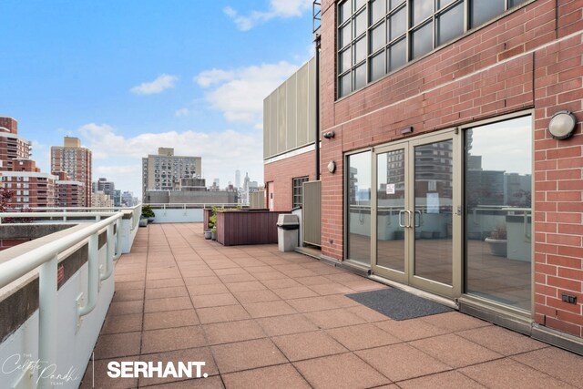 250 E 30th St Unit 8D, New York City, NY 10016 - view of patio featuring a view of city